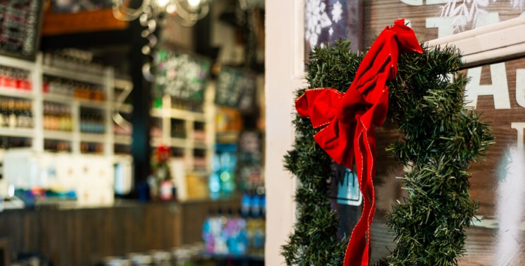 Wreath with red bow on door