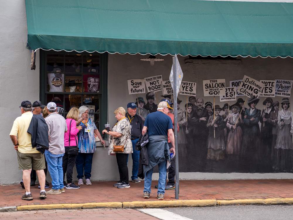 People lined up outside the Prohibition Mural in Savannah City Market