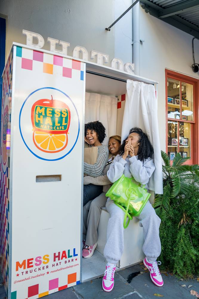 Girls in the photo booth at Mess Hall at Savannah City Market